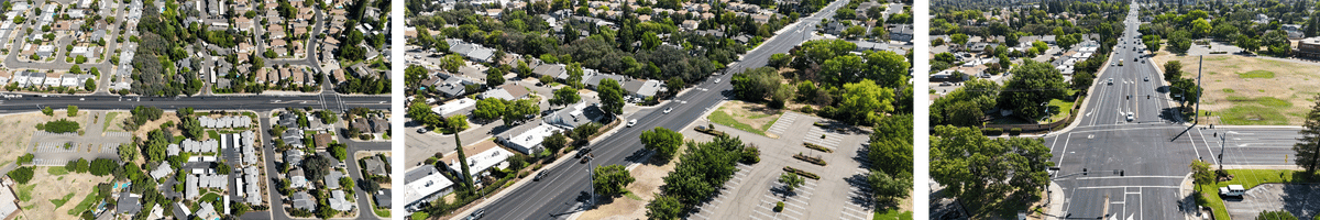 Aerial view of a neighborhood with tree-lined streets, rows of houses, and a large green park area beside a main road.